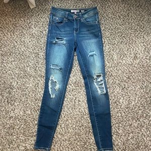 Mid-rise Ripped Skinny Jeans